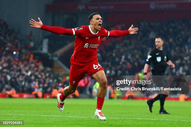 Trent Alexander-Arnold of Liverpool celebrates scoring his side's fourth goal during the Premier League match between Liverpool FC and Fulham FC at...