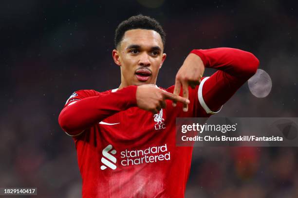 Trent Alexander-Arnold of Liverpool celebrates scoring his side's fourth goal during the Premier League match between Liverpool FC and Fulham FC at...