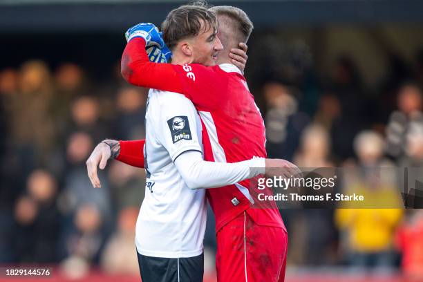 Michel Stoecker and Luca Unbehaun of Verl celebrate after winning the 3. Liga match between SC Verl and Dynamo Dresden at SPORTCLUB Arena on December...