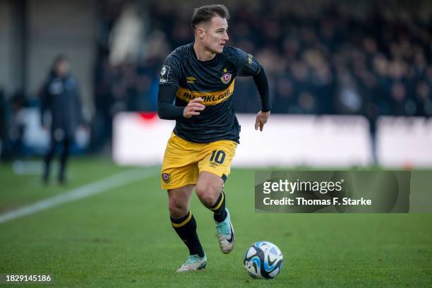 Jakob Lemmer of Dresden runs with the ball during the 3. Liga match between SC Verl and Dynamo Dresden at SPORTCLUB Arena on December 03, 2023 in...