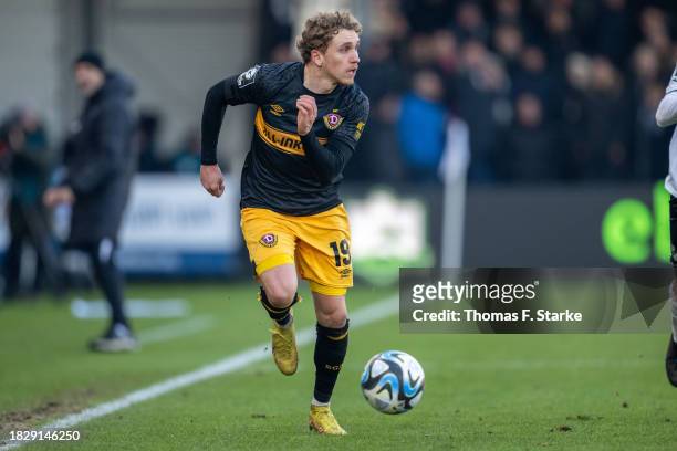 Luca Herrmann of Dresden runs with the ball during the 3. Liga match between SC Verl and Dynamo Dresden at SPORTCLUB Arena on December 03, 2023 in...
