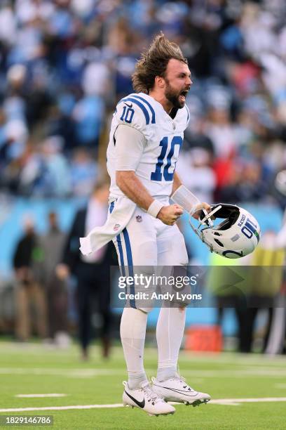 Gardner Minshew of the Indianapolis Colts reacts after defeating the Tennessee Titans in overtime at Nissan Stadium on December 03, 2023 in...