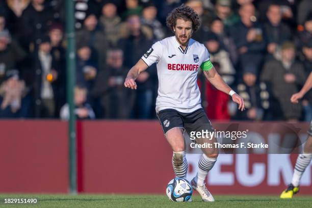 Mael Corboz of Verl runs with the ball during the 3. Liga match between SC Verl and Dynamo Dresden at SPORTCLUB Arena on December 03, 2023 in Verl,...