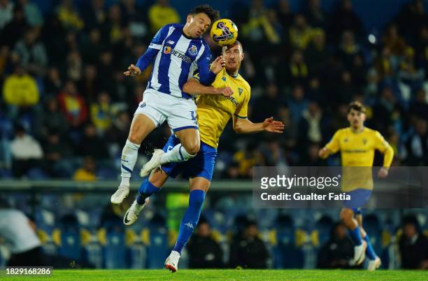 Pepe of FC Porto with Volnei Feltes of GD Estoril Praia in action during the Allianz Cup match between GD Estoril Praia and FC Porto at Estadio...