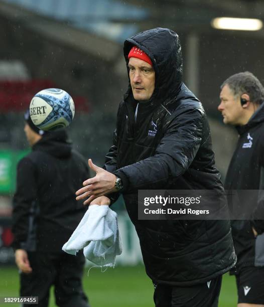 Alex Codling , the head coach of Newcastle Falcons catches a. Ball during the Gallagher Premiership Rugby match between Leicester Tigers and...