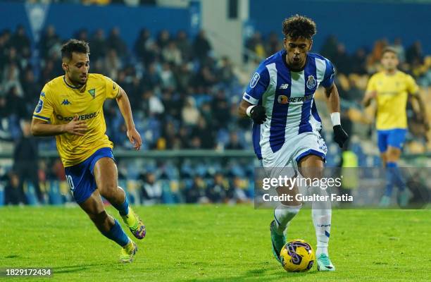 Goncalo Borges of FC Porto with Rafik Guitane of GD Estoril Praia in action during the Allianz Cup match between GD Estoril Praia and FC Porto at...