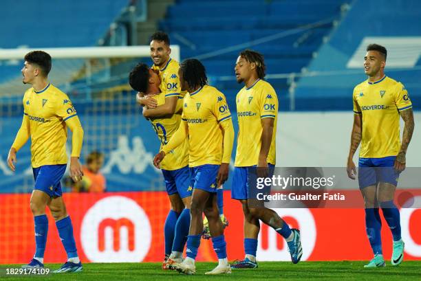 Rafik Guitane of GD Estoril Praia celebrates with teammates after scoring a goal during the Allianz Cup match between GD Estoril Praia and FC Porto...