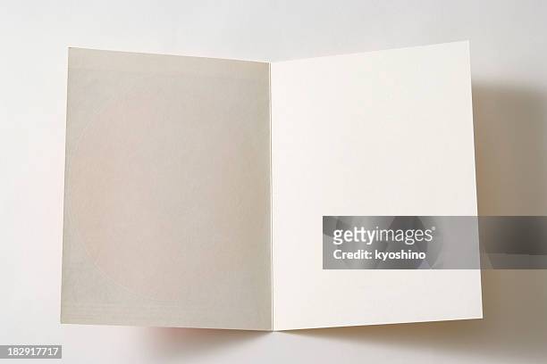 isolated shot of opened antique blank paper on white background - cards stock pictures, royalty-free photos & images