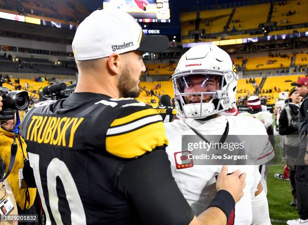 Mitch Trubisky of the Pittsburgh Steelers and Kyler Murray of the Arizona Cardinals embrace after the game at Acrisure Stadium on December 03, 2023...