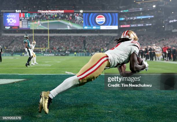 Brandon Aiyuk of the San Francisco 49ers catches a pass for a touchdown during the second quarter in the game against the Philadelphia Eagles at...