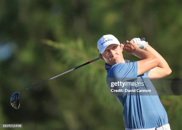 Matthew Fitzpatrick of England plays his tee shot on the 13th hole during the final round of the Hero World Challenge at Albany Golf Course on...