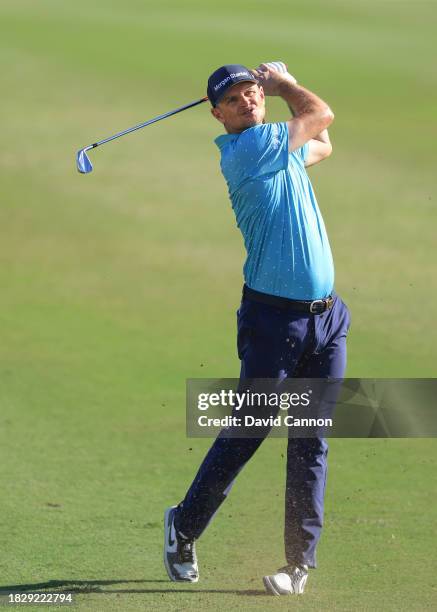 Justin Rose of England plays his second shot on the 15th hole during the final round of the Hero World Challenge at Albany Golf Course on December...