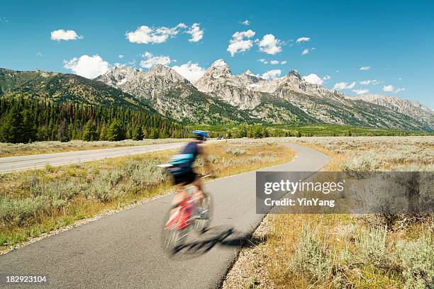 mountain biking, road cycling in grand teton national park, usa - grand teton bildbanksfoton och bilder