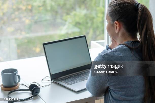 working from home - looking over shoulder stock pictures, royalty-free photos & images
