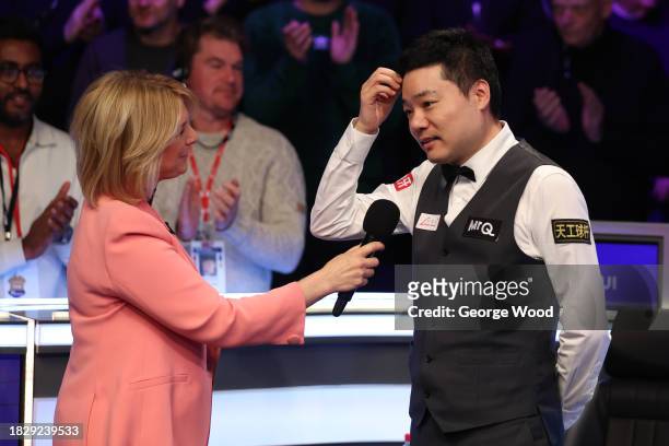 Ding Junhui of China reacts after defeat against Ronnie O'Sullivan of England in their Final match on Day Nine of the MrQ UK Snooker Championship...