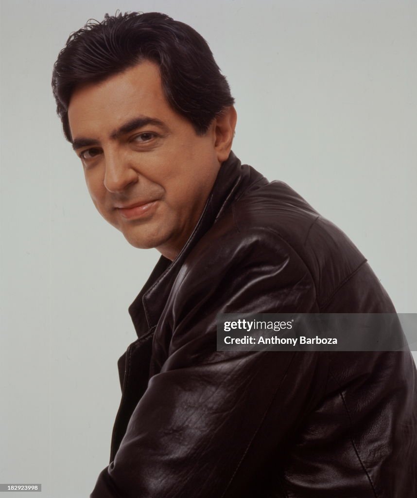 Portrait of American actor Joe Mantegna as he poses, dressed in a