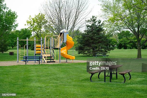 city park - playground stock pictures, royalty-free photos & images