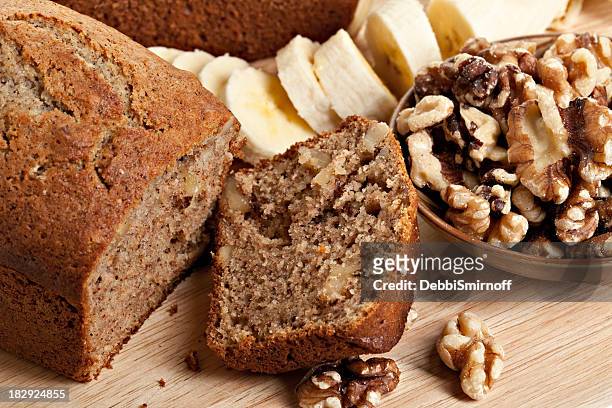 sliced banana bread , walnuts and bananas - walnuts stockfoto's en -beelden