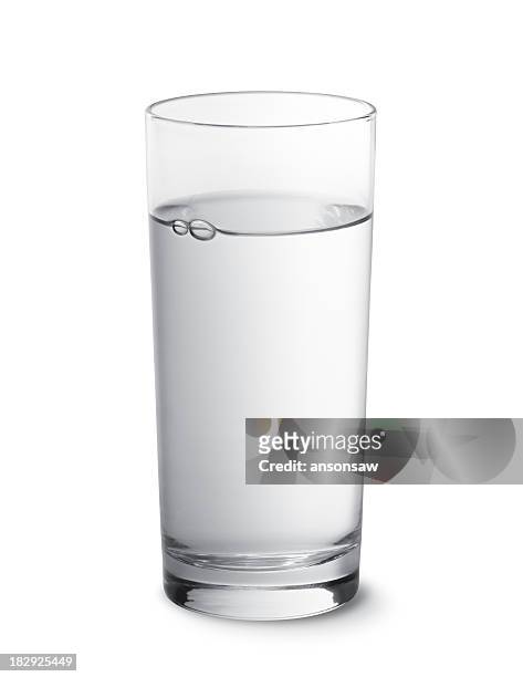 glass of water photographed against a white background - drinking glass stock pictures, royalty-free photos & images