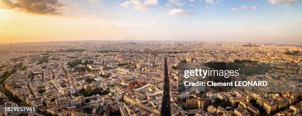 cityscape of paris at sunset seen from above, paris, ile-de-france (ile de france), central france. - tour montparnasse stock pictures, royalty-free photos & images