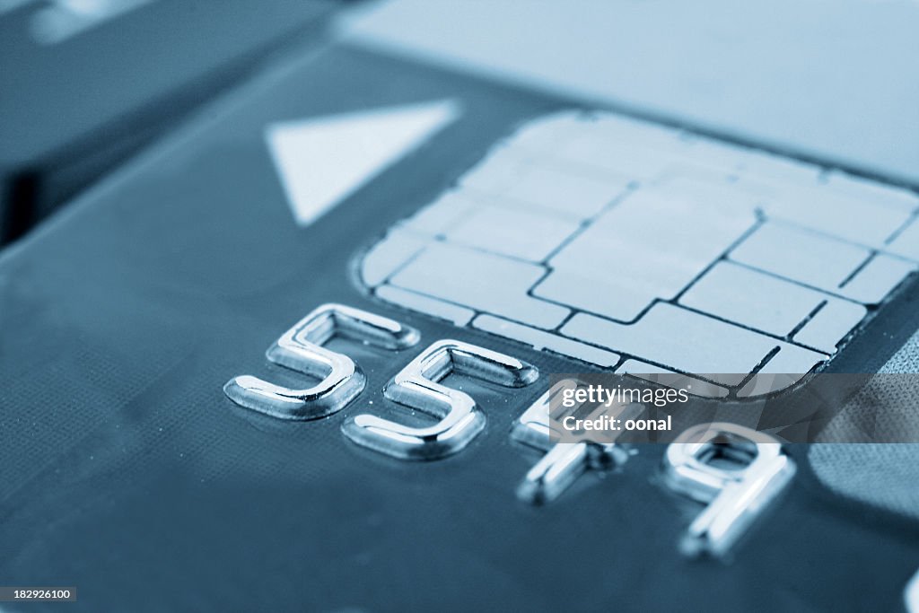Close-Up Metallic Numbers on a Chip Card