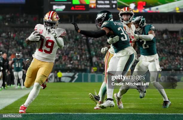 Deebo Samuel of the San Francisco 49ers scores a touchdown during the third quarter in the game against the Philadelphia Eagles at Lincoln Financial...