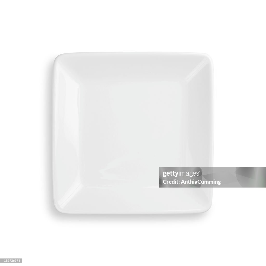 Empty dinner plate isolated on white with clipping path