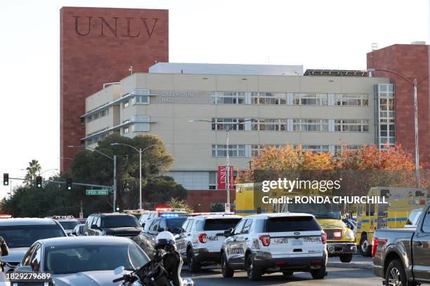 Emergency crews and law enforcement respond to a shooting at the University of Nevada, Las Vegas, campus in Las Vegas on December 6, 2023. Three...