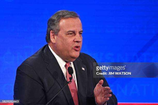 Former Governor of New Jersey Chris Christie gestures as he speaks during the fourth Republican presidential primary debate at the University of...