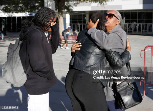 Nyssa Newman, center, a student and employee at the UNLV, reunites with her mother Monique Mitchell Jones and her sister Jordyn Ramsey, left, outside...