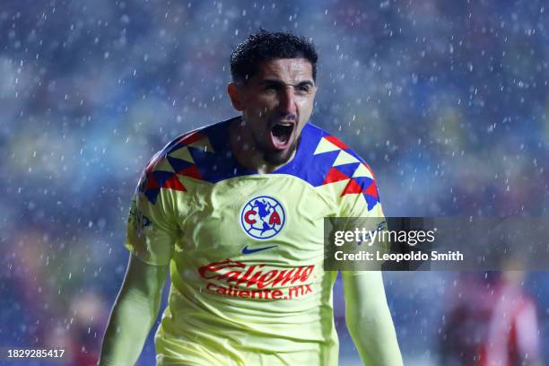 Diego Valdes of America celebrates after scoring the team's first goal during the semifinals first leg match between Atletico San Luis and America as...