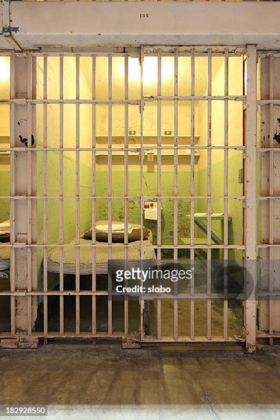 locked empty prison cell - capital punishment stock pictures, royalty-free photos & images