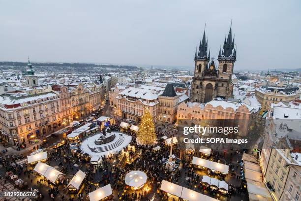 View of the people at the traditional Christmas market at Old Town Square in Prague.