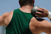 Athletic male at shot put