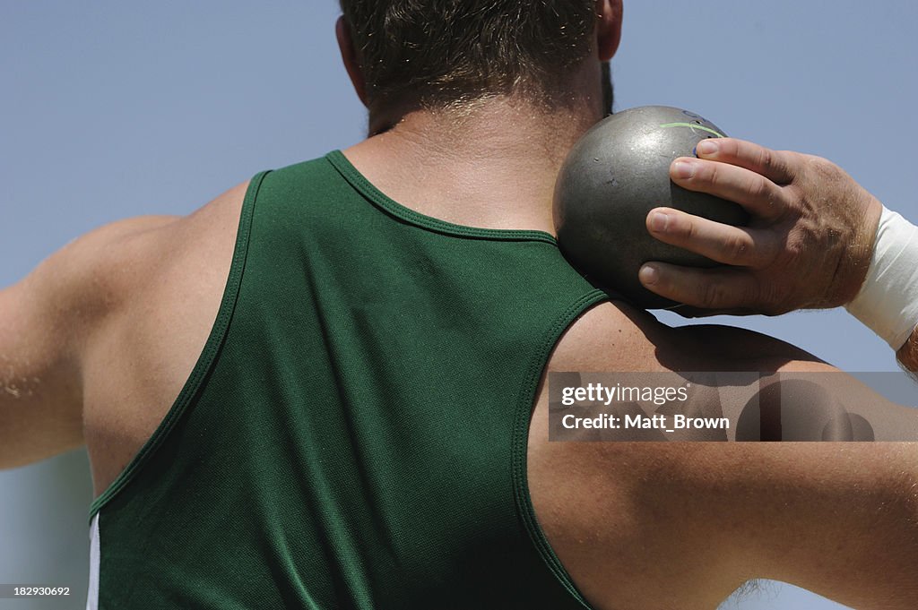 Athletic male at shot put