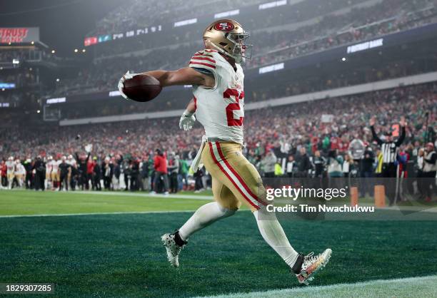 Christian McCaffrey of the San Francisco 49ers scores a touchdown in the against the Philadelphia Eagles at Lincoln Financial Field on December 03,...