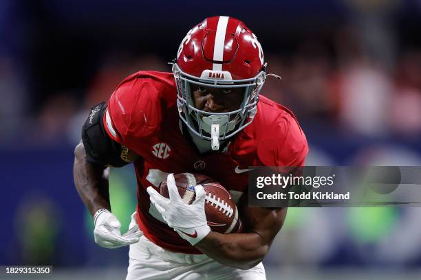 Jam Miller of the Alabama Crimson Tide makes a reception and turns upfield to rush in for a touchdown during the second quarter of the SEC...