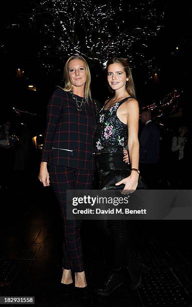 Alice Naylor-Leyland and Katie Readman attend the Vertu launch of the new Constellation smartphone at One Mayfair on October 2, 2013 in London,...