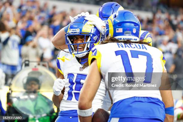 Demarcus Robinson of the Los Angeles Rams celebrates with teammates after scoring a touchdown in the third quarter against the Cleveland Browns at...