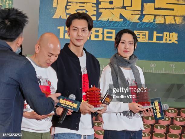 Director Dante Lam Chiu-yin, actor William Chan Wai-ting and actress Isabella Leong attend the road show of film 'Bursting Point' on December 3, 2023...