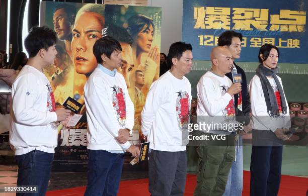Actor Nick Cheung Ka-fai, director Dante Lam Chiu-yin, actor William Chan Wai-ting and actress Isabella Leong attend the road show of film 'Bursting...