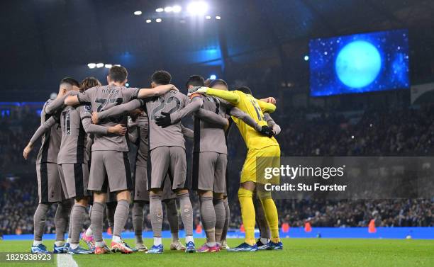 The Tottenham Hotspur team huddle prior to the Premier League match between Manchester City and Tottenham Hotspur at Etihad Stadium on December 03,...