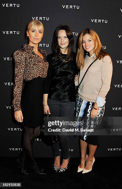 Lady Emily Compton, Arabella Musgrave and guest attend the Vertu launch of the new Constellation smartphone at One Mayfair on October 2, 2013 in...