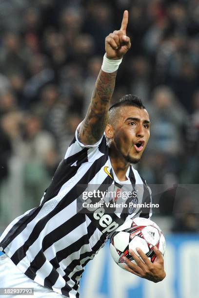 Arturo Vidal of Juventus celebrates his goal during UEFA Champions League Group B match between Juventus and Galatasaray AS at Juventus Arena on...