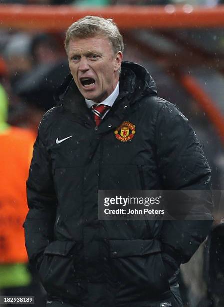 Manager David Moyes of Manchester United shouts instructions from the touchline during the UEFA Champions League Group A match between Shakhtar...