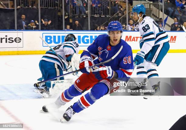 Will Cuylle of the New York Rangers scores at 15:0-3 of the second period against Mackenzie Blackwood of the San Jose Sharks at Madison Square Garden...