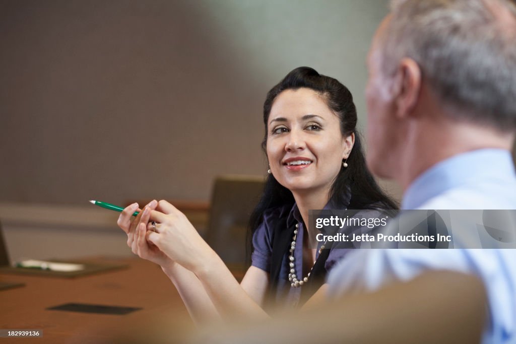 Business people talking in meeting