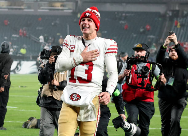 Brock Purdy of the San Francisco 49ers celebrates a win over the Philadelphia Eagles at Lincoln Financial Field on December 03, 2023 in Philadelphia,...