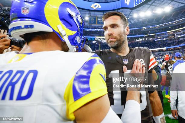 Matthew Stafford of the Los Angeles Rams and Joe Flacco of the Cleveland Browns meet after the Rams beat the Browns 36-19 at SoFi Stadium on December...