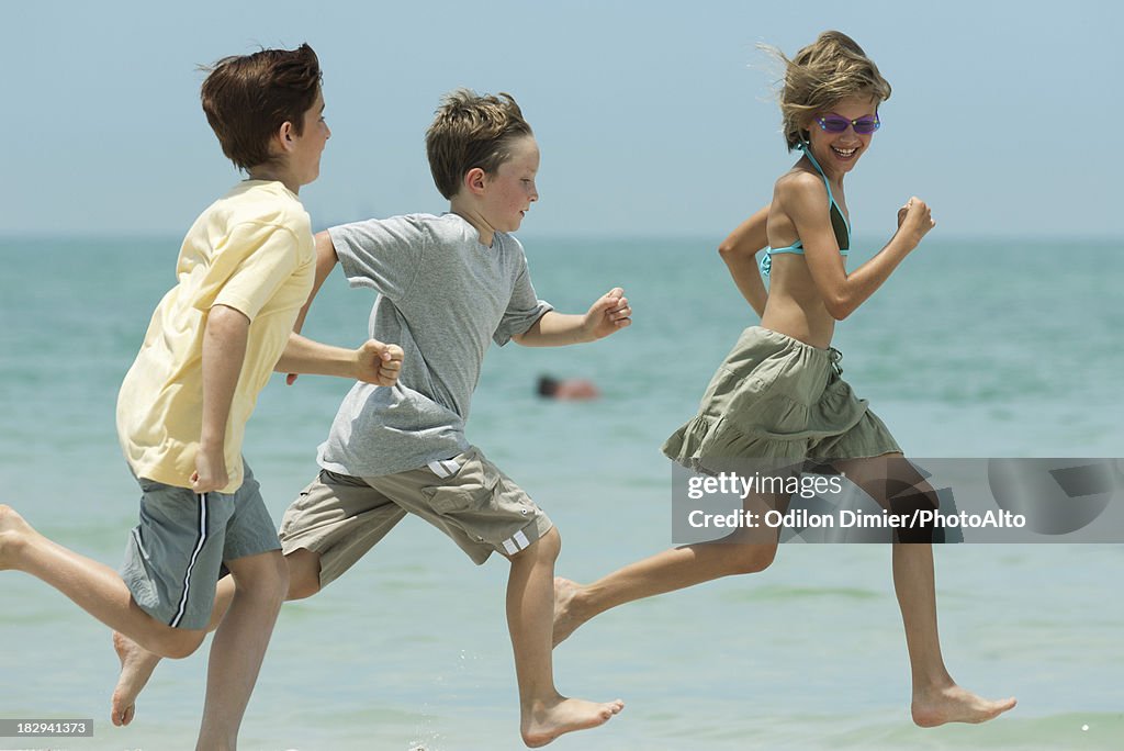 Children Racing On Beach High-Res Stock Photo - Getty Images